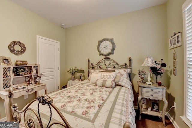 bedroom featuring hardwood / wood-style floors