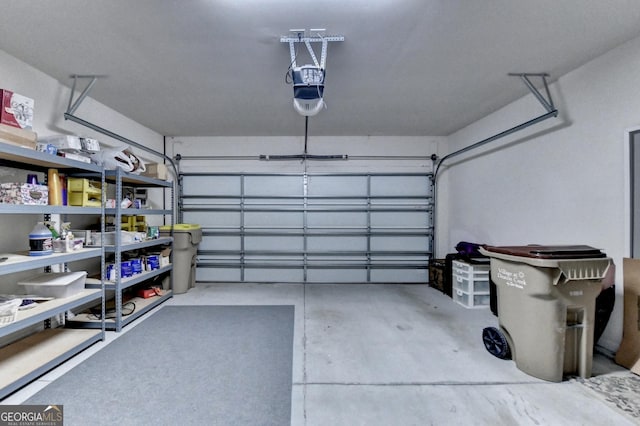 garage featuring a garage door opener