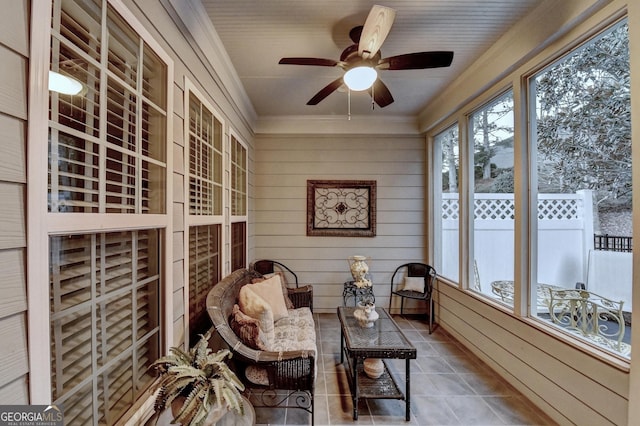 sunroom / solarium with ceiling fan