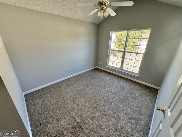 carpeted spare room featuring ceiling fan, a textured ceiling, and lofted ceiling