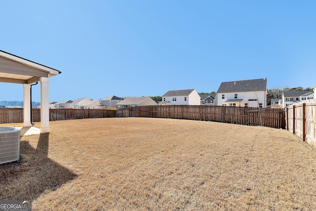 view of yard featuring central AC