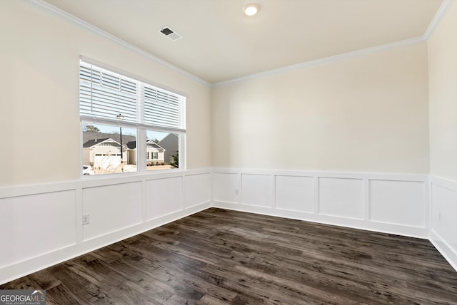 unfurnished room with dark hardwood / wood-style flooring and ornamental molding