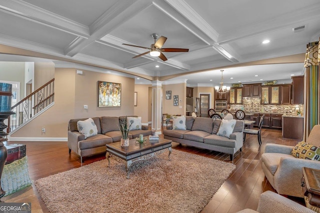 living room with beamed ceiling, ornamental molding, and coffered ceiling