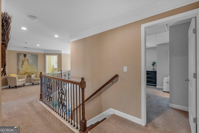 hallway with light carpet and crown molding