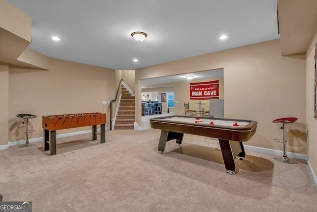 game room featuring light colored carpet