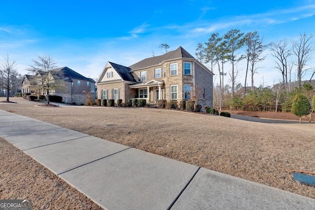 view of front of property featuring a front yard