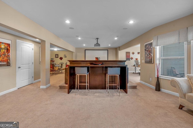 bar featuring light colored carpet