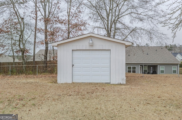 garage with a lawn