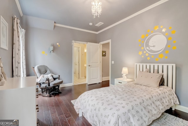 bedroom featuring ornamental molding and dark hardwood / wood-style floors