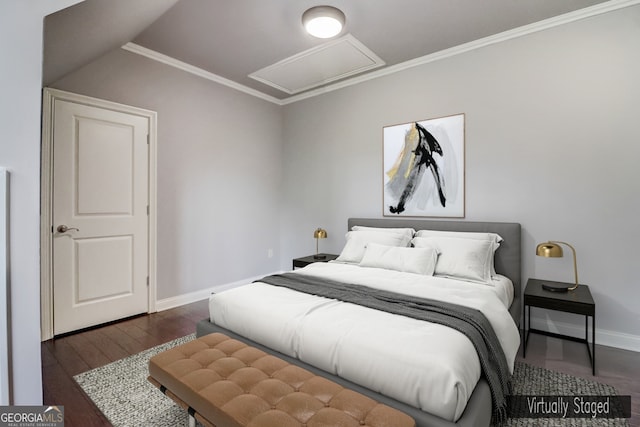 bedroom featuring crown molding and dark wood-type flooring