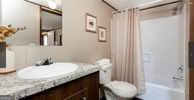 full bathroom with vanity, toilet, and shower / bath combo with shower curtain