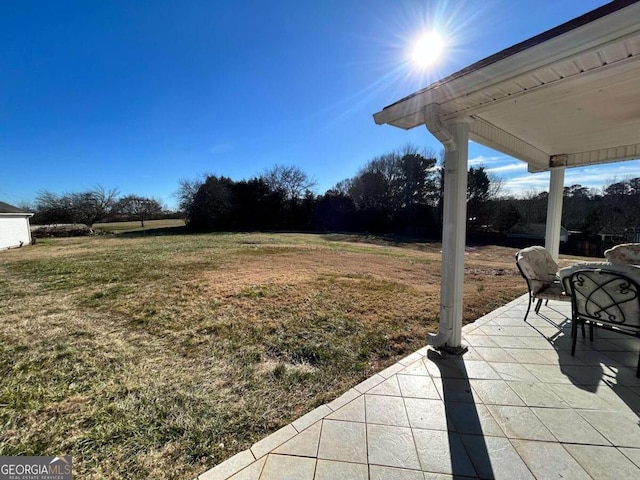 view of yard with a patio area