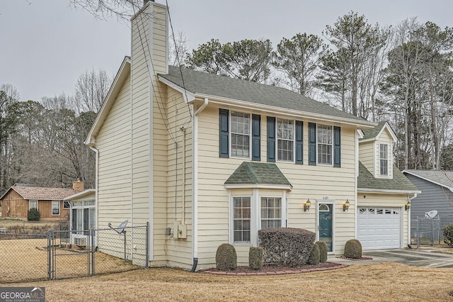 view of front of home with a garage