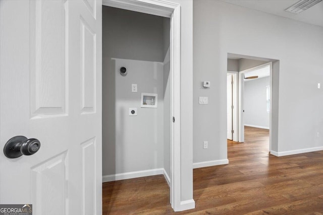 hall with dark wood-type flooring