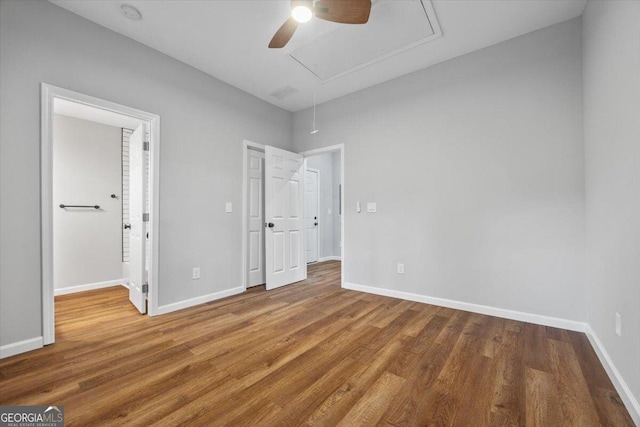 unfurnished bedroom with hardwood / wood-style flooring and ceiling fan