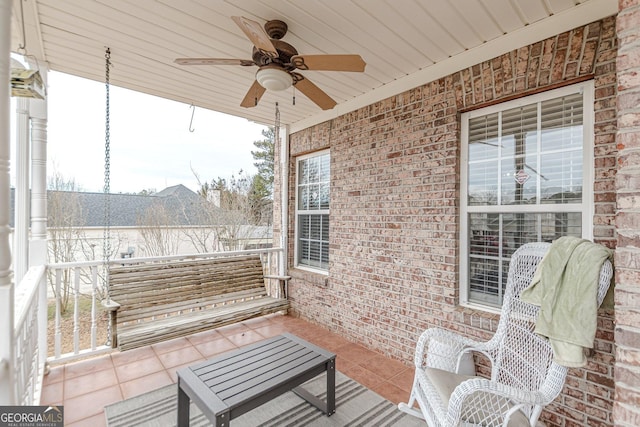 exterior space with ceiling fan