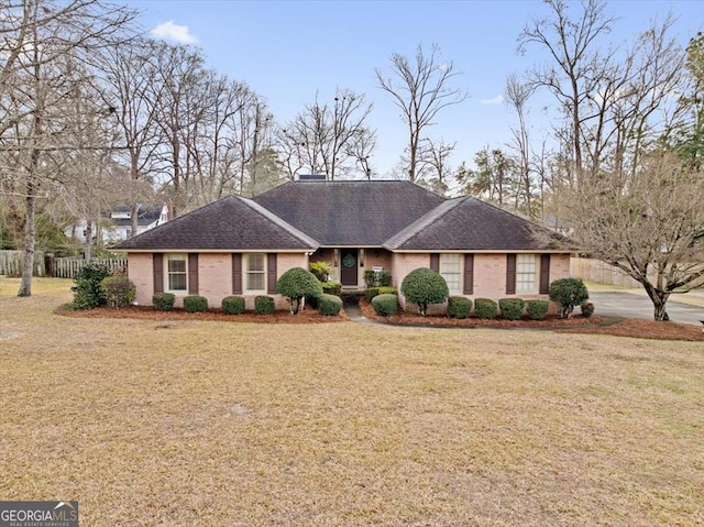 ranch-style house with a front yard