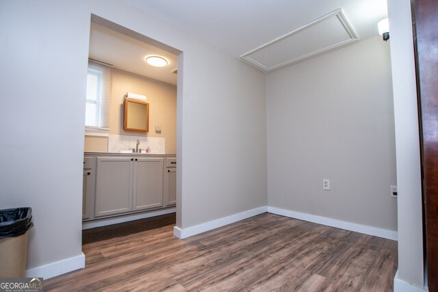 unfurnished room featuring hardwood / wood-style floors