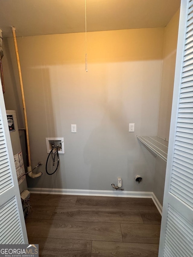 washroom featuring washer hookup and dark hardwood / wood-style floors