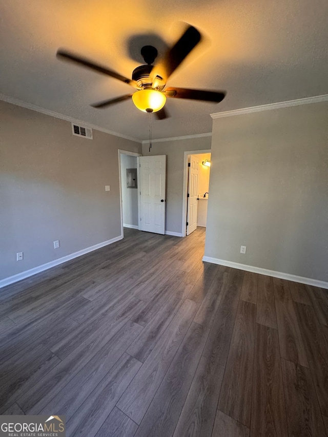 interior space with ornamental molding, dark hardwood / wood-style floors, and ceiling fan