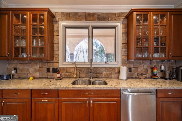 kitchen featuring crown molding, tasteful backsplash, stainless steel dishwasher, sink, and light stone counters