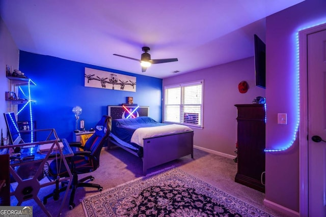 carpeted bedroom with ceiling fan