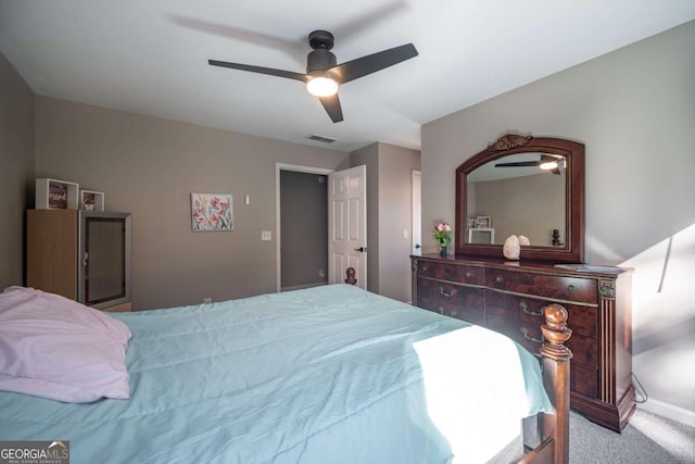 carpeted bedroom with ceiling fan