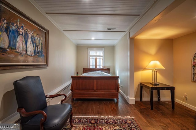 bedroom featuring dark hardwood / wood-style flooring