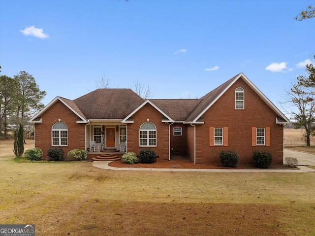 view of front of property with a front lawn