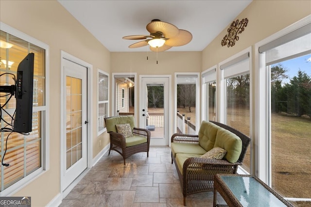 sunroom / solarium with ceiling fan