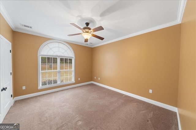 unfurnished room featuring carpet flooring, ceiling fan, and ornamental molding