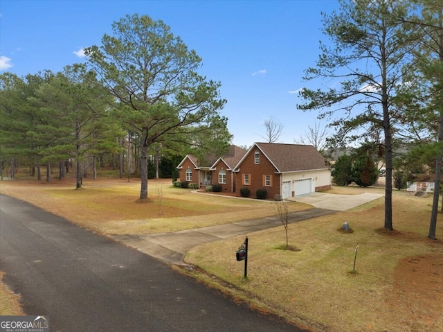 ranch-style house with a garage and a front lawn