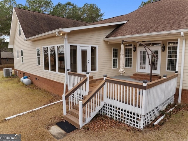 back of house featuring cooling unit