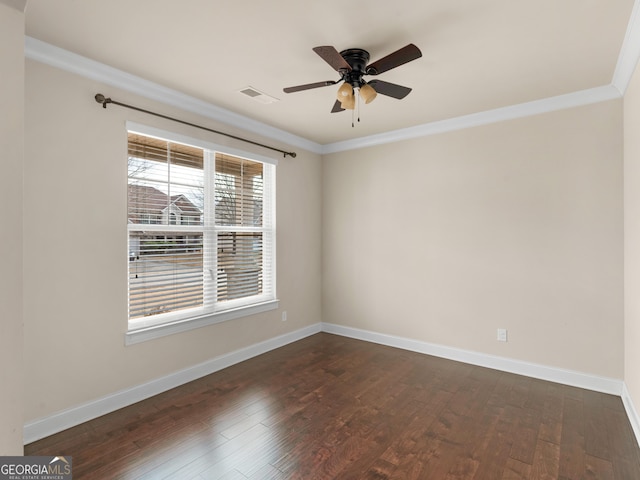 unfurnished room featuring baseboards, visible vents, dark wood finished floors, a ceiling fan, and ornamental molding