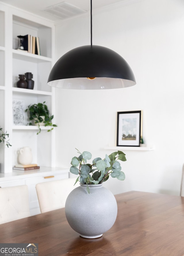 dining space featuring built in features