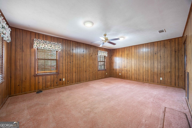 carpeted empty room with ceiling fan