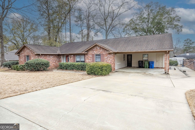 ranch-style house with a carport