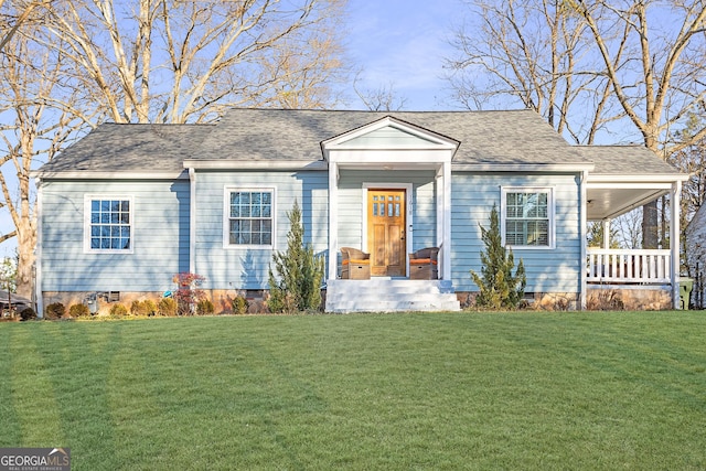 view of front of home featuring a front yard and a porch