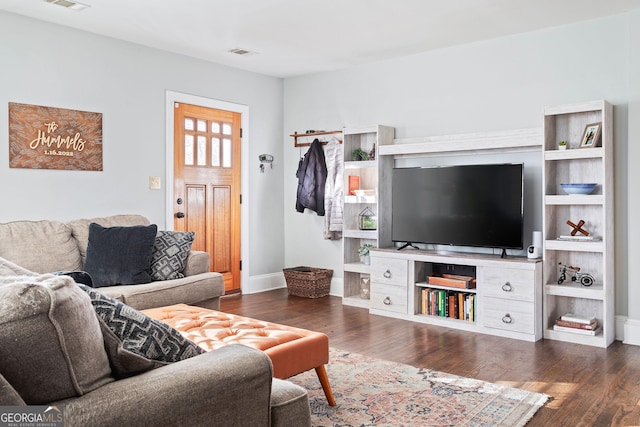 living room featuring dark hardwood / wood-style floors