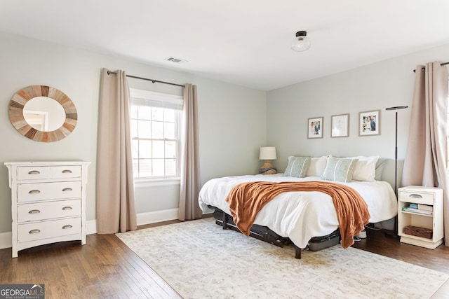 bedroom featuring hardwood / wood-style floors