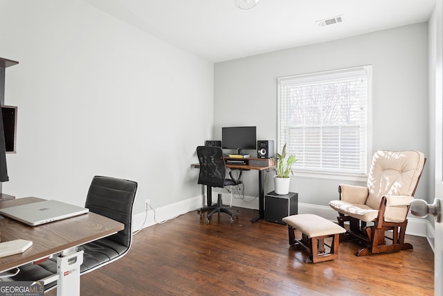 office with dark hardwood / wood-style floors