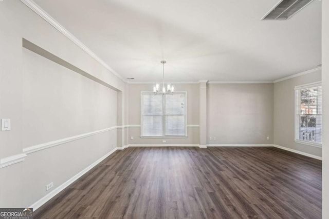 unfurnished dining area featuring crown molding, dark wood-type flooring, a notable chandelier, and plenty of natural light