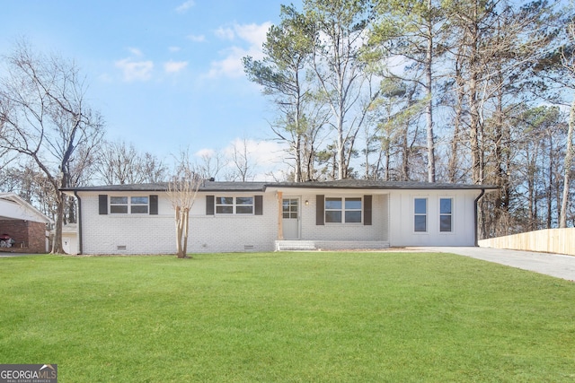 ranch-style home with a front yard