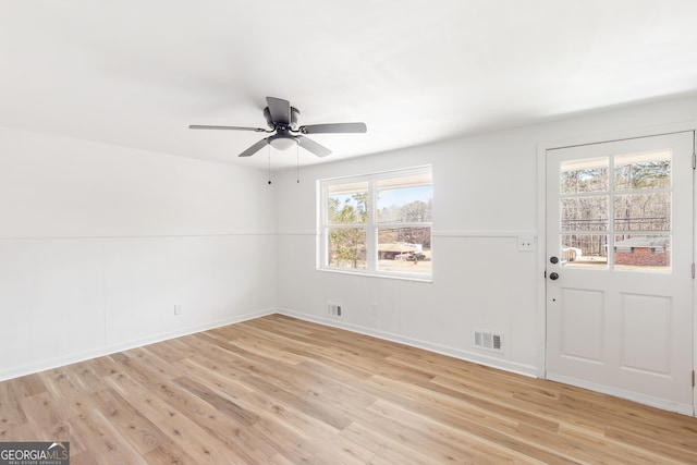 interior space with light hardwood / wood-style floors and ceiling fan