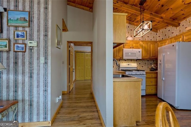 kitchen with hanging light fixtures, backsplash, wooden ceiling, and white appliances