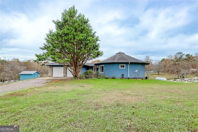 view of yard with a garage