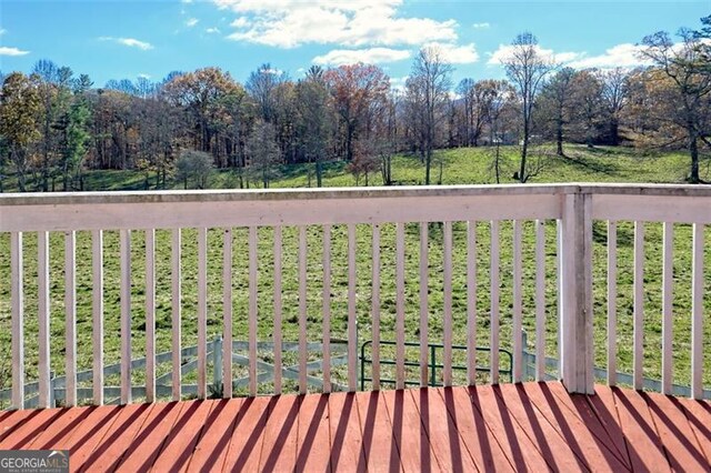 deck featuring a yard