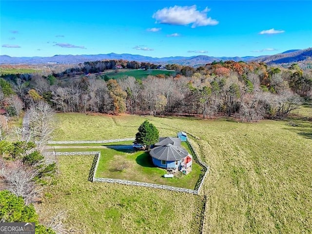 aerial view featuring a mountain view and a rural view