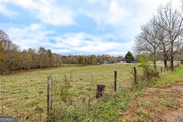 view of yard featuring a rural view