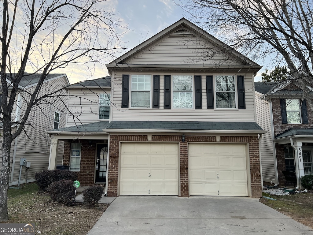 view of front of home with a garage